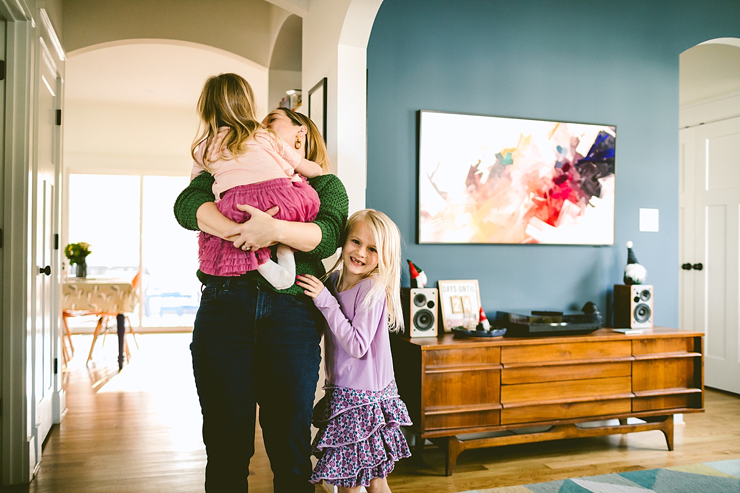 Girl hugging her mom at home