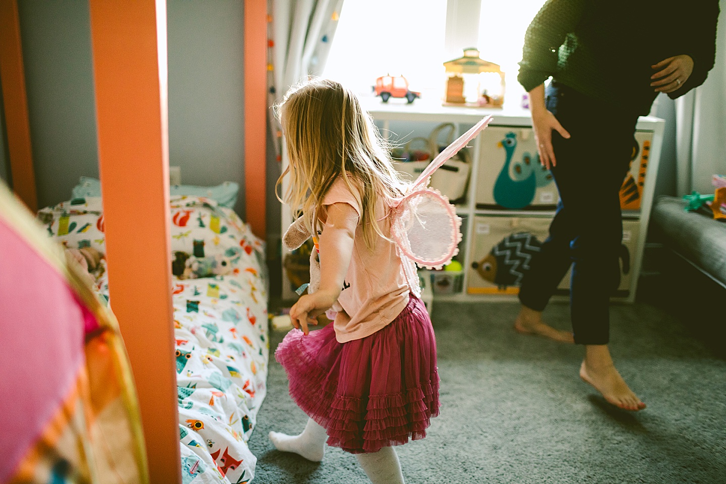 Little girl wearing fairy wings