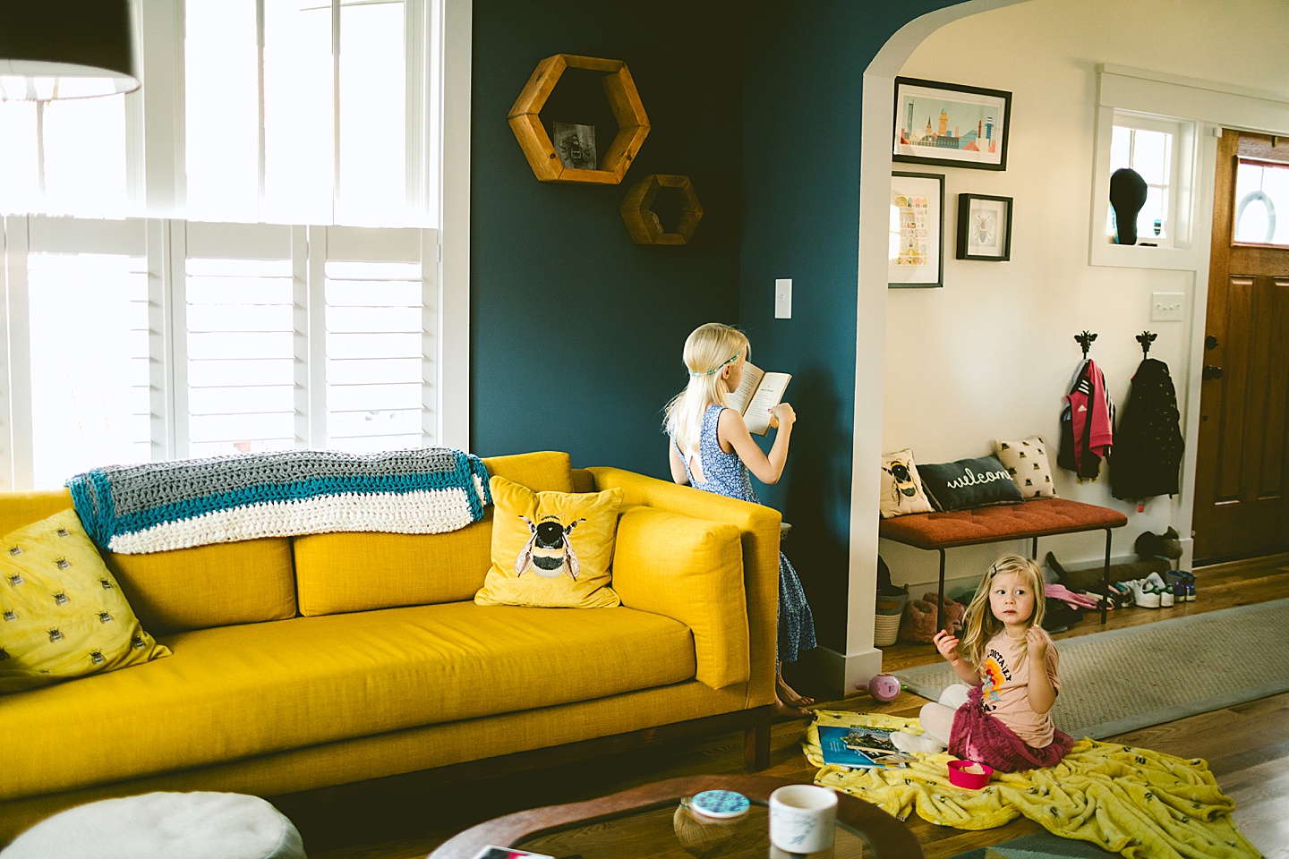 Siblings sitting in the living room