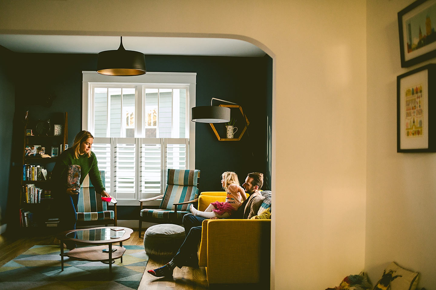 Parents in living room with kids