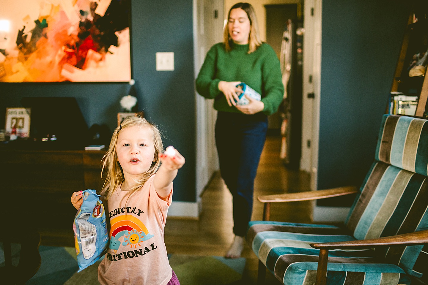 Girl offering a marshmallow