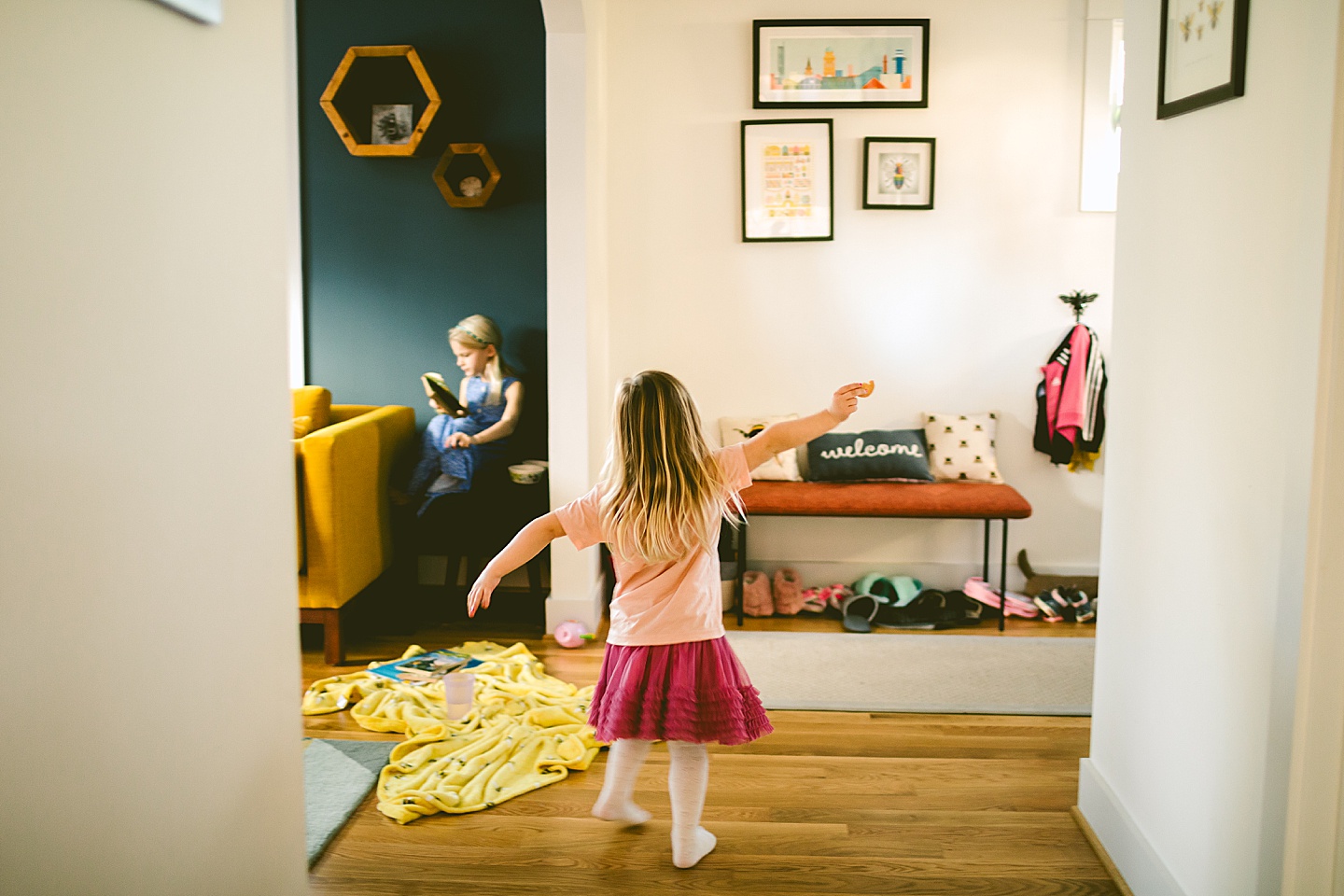 Little girl dancing in living room