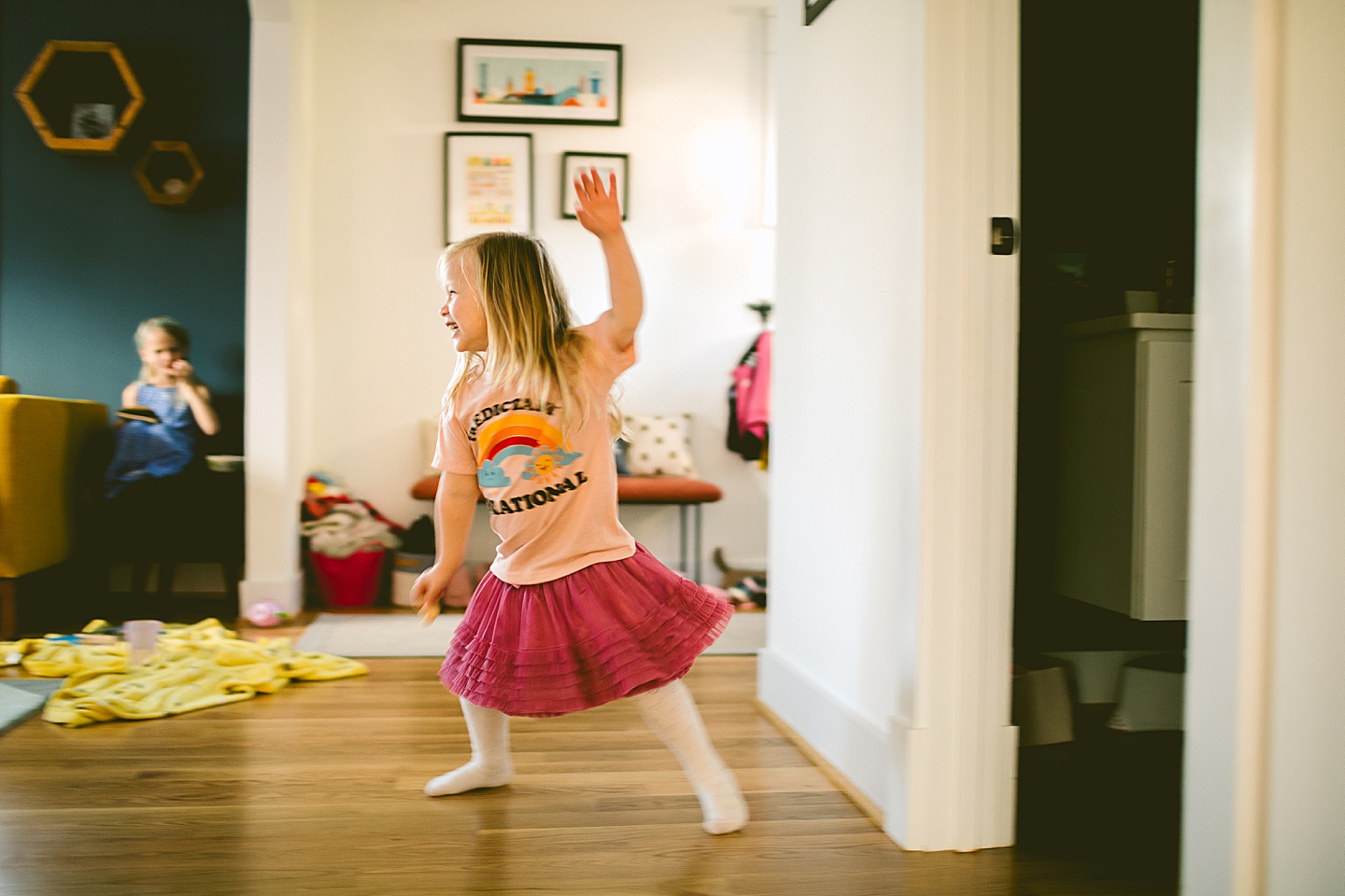 Little girl dancing in living room