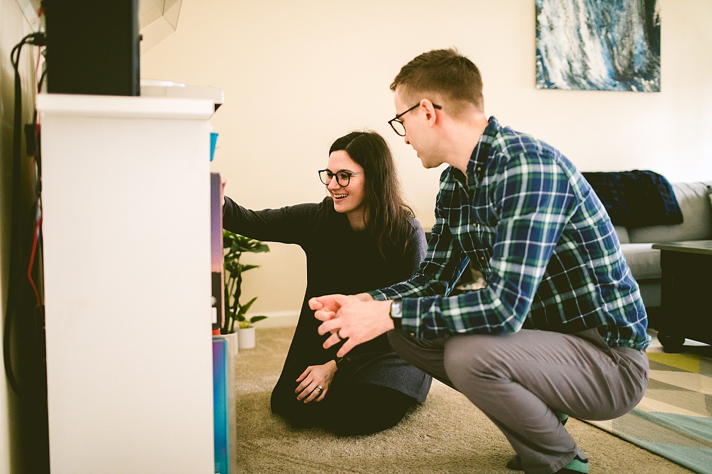 Couple choosing a vinyl record to play