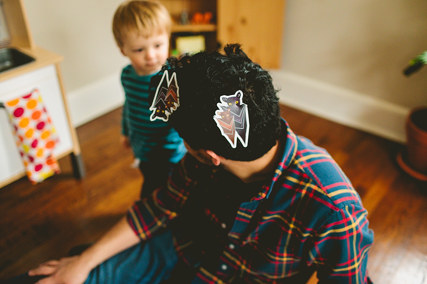 Bat logo stickers in dad's hair