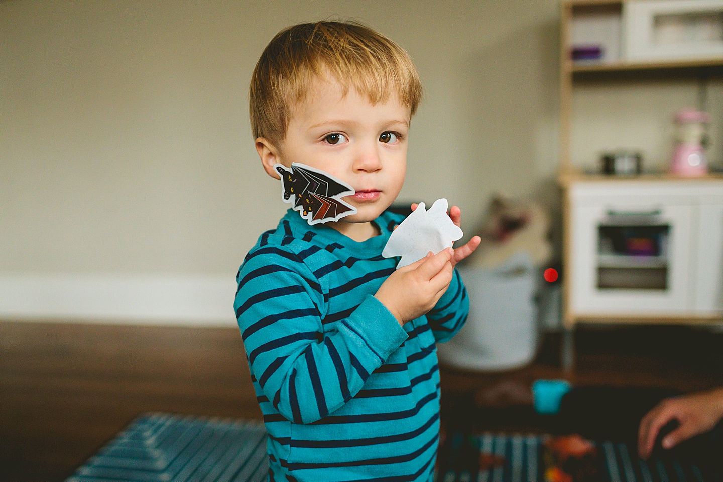 Kid with stickers on face