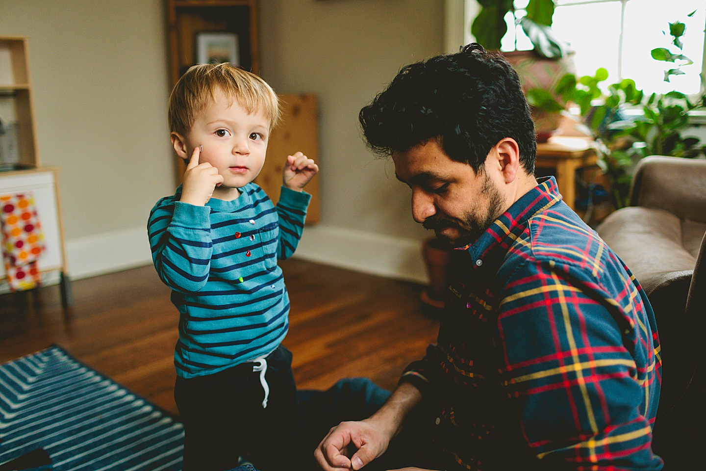 Dad and son playing with stickers