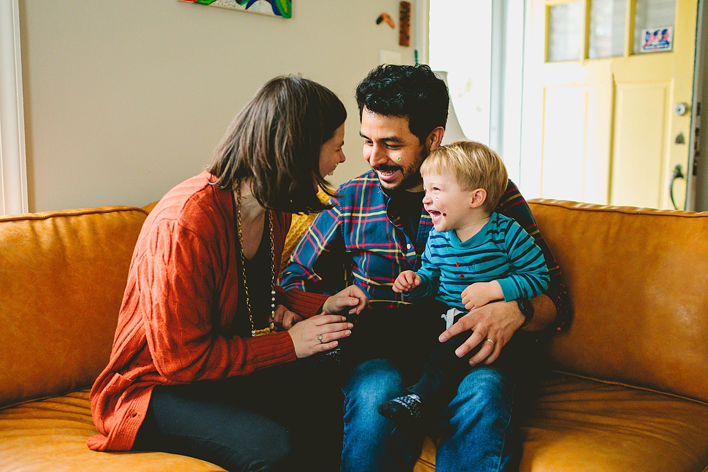 Durham NC family sitting on couch