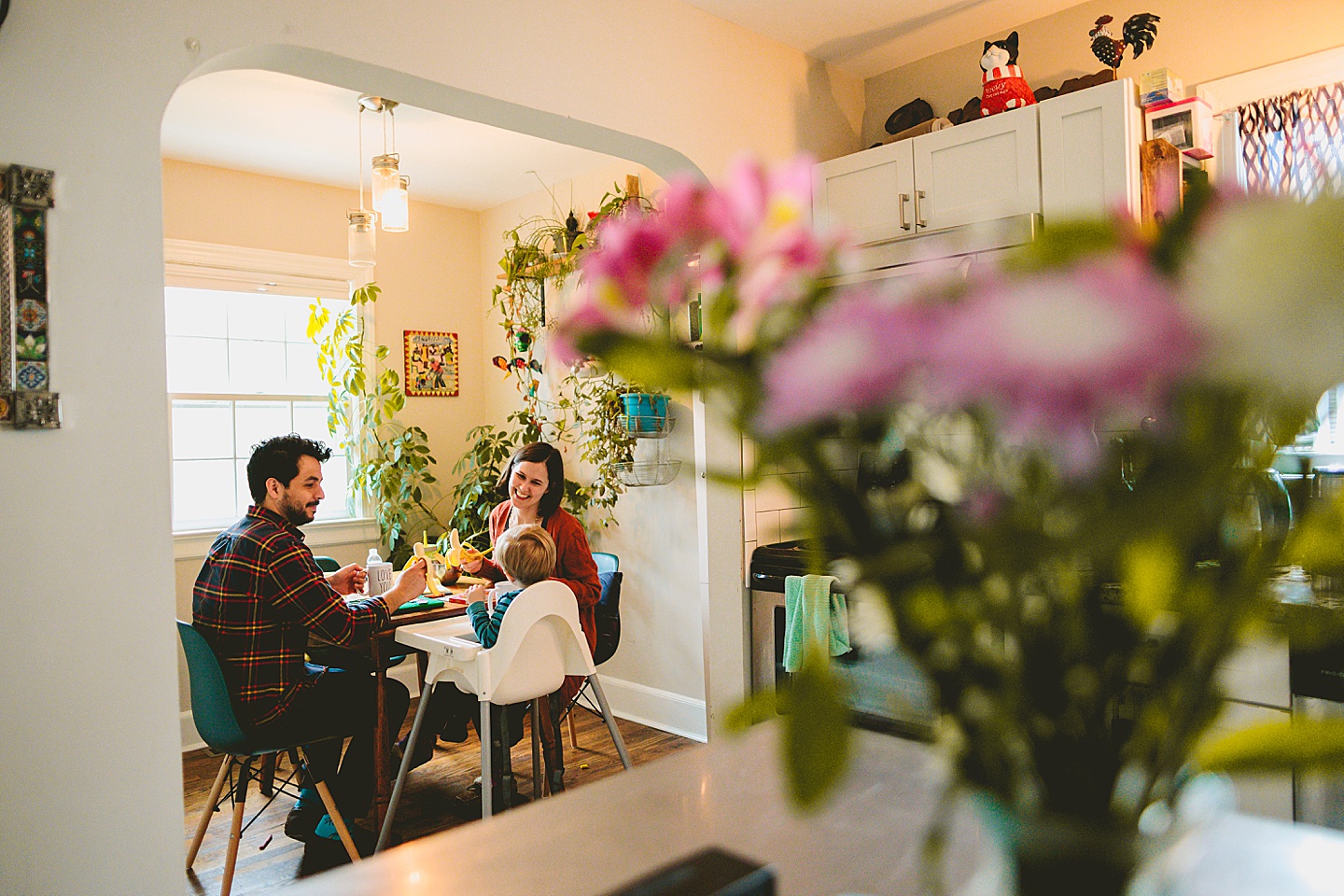 Family sitting at eat-in kitchen table