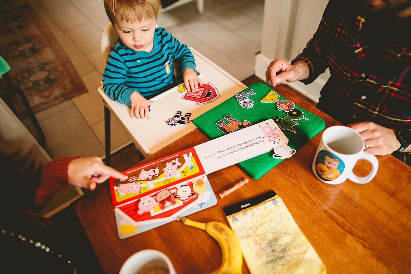 Kid reading book about Old MacDonald