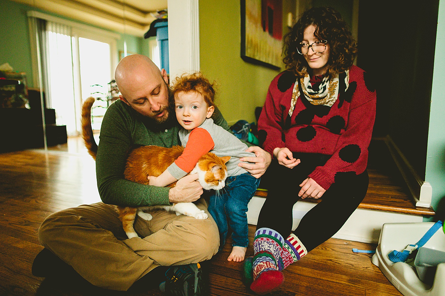 Family portrait with cat in home