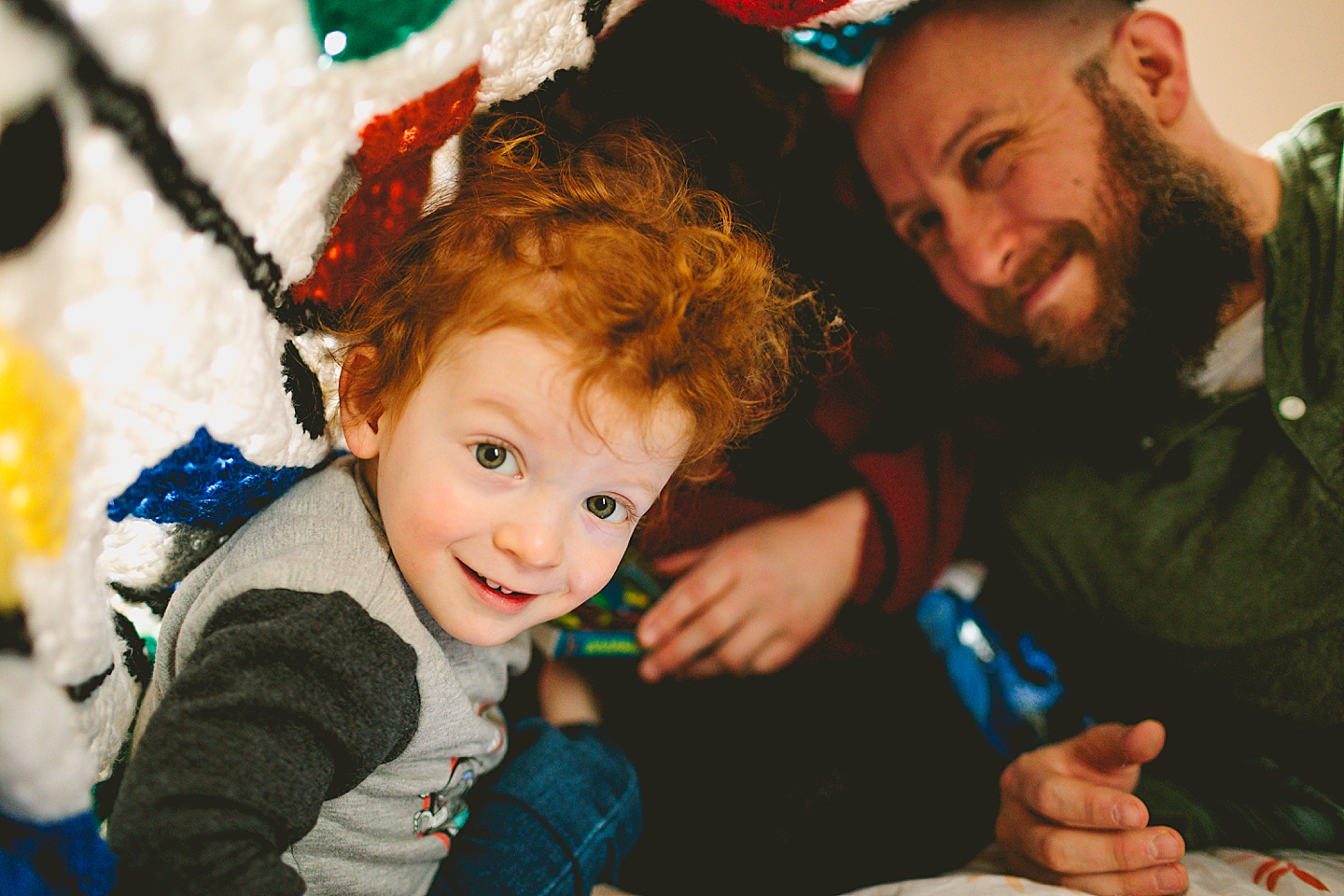 Kids and parents in blanket fort