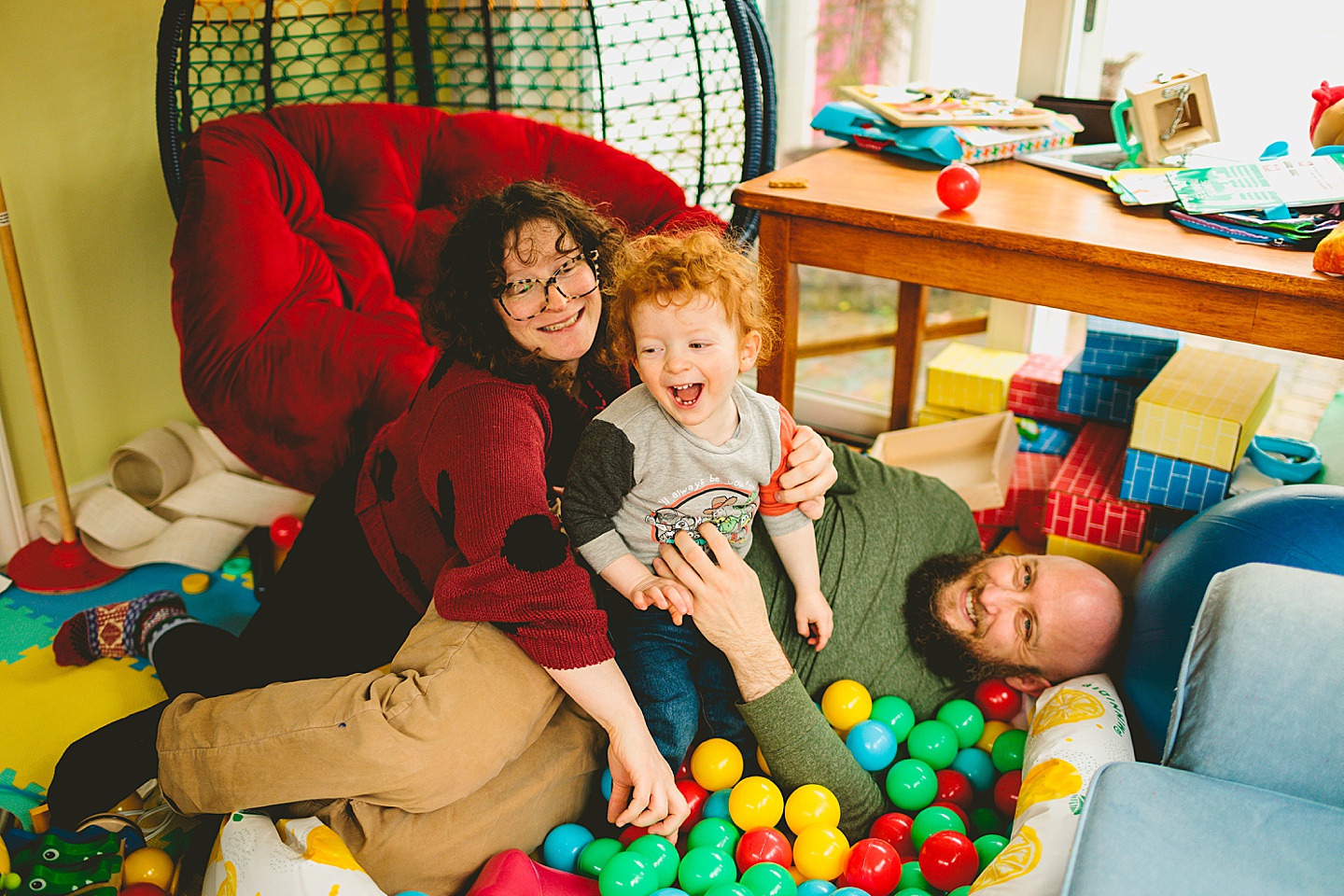 Toddler playing in ballpit