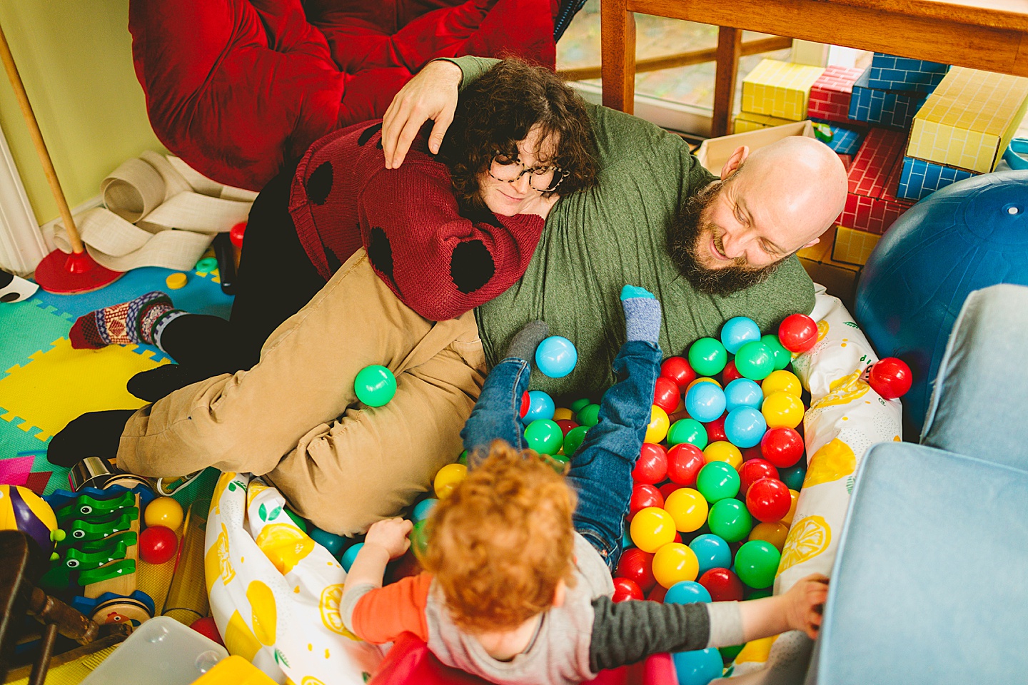 Toddler playing in ballpit