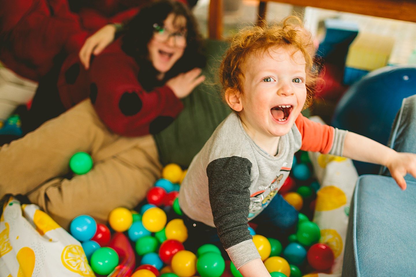 Toddler playing in ballpit