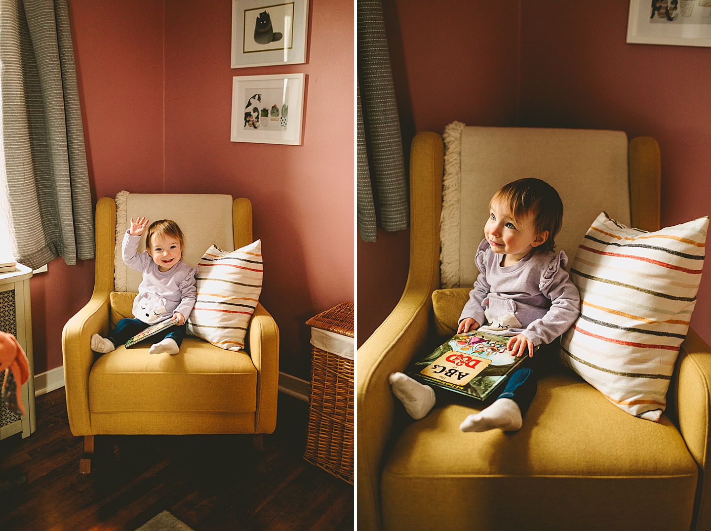 smiling toddler reading book in a chair