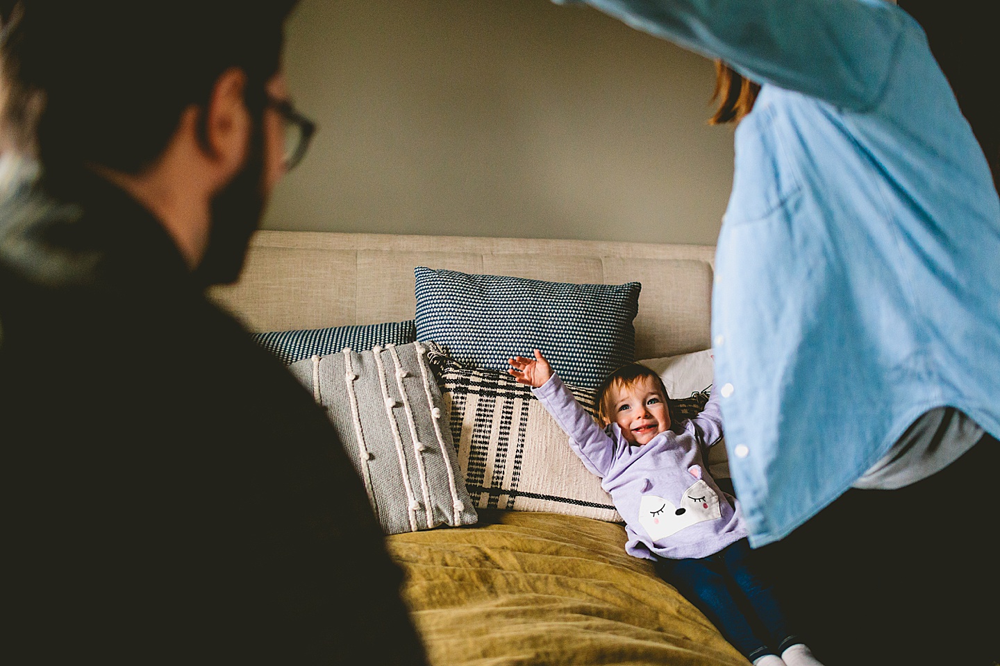 toddler smiling during family photos