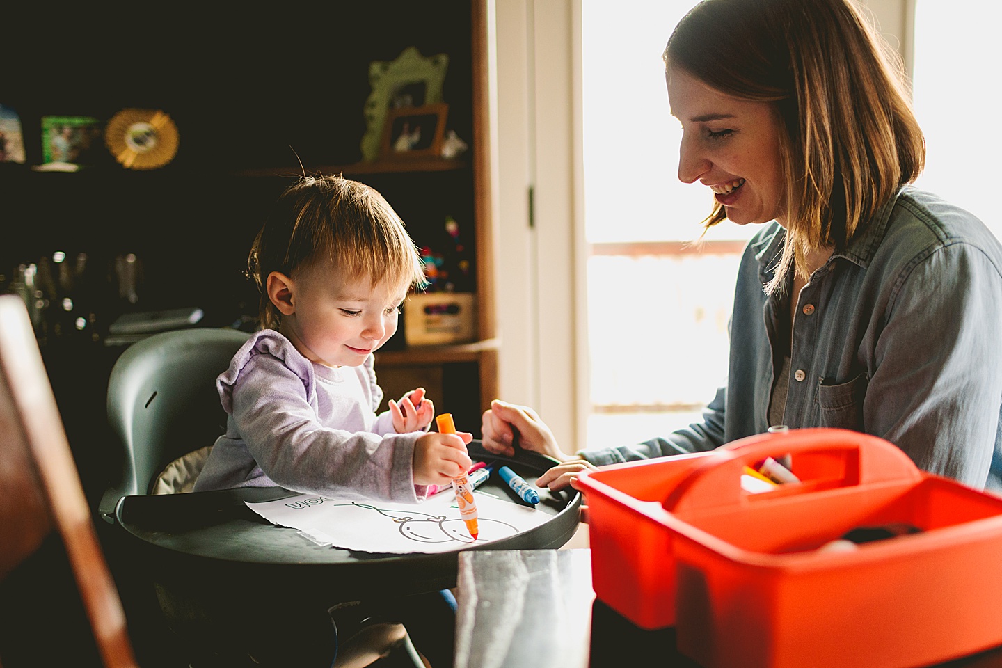 parents coloring with daughter