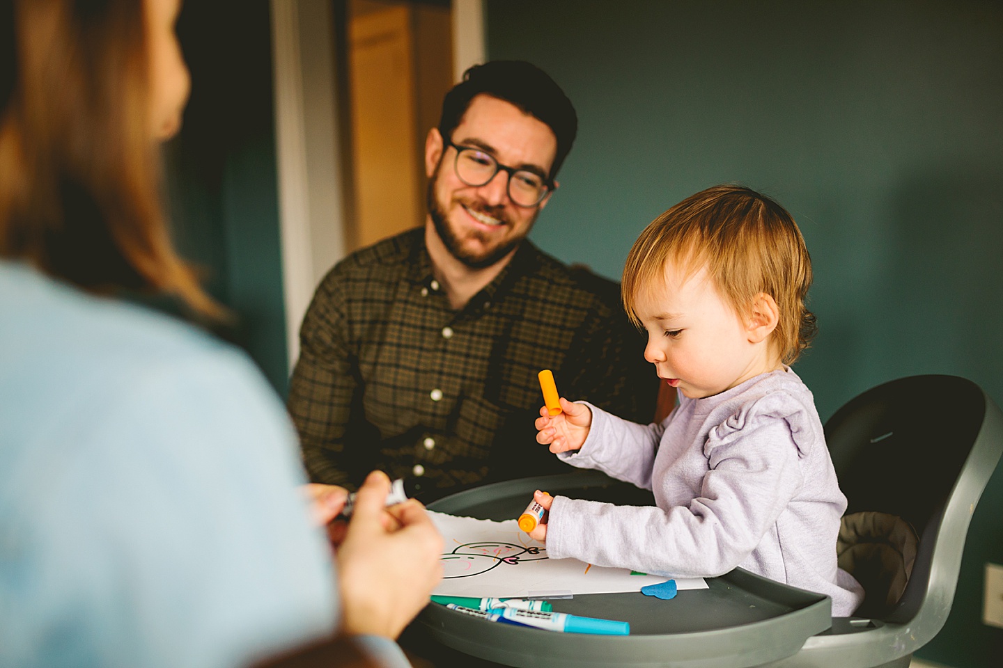 parents coloring with daughter