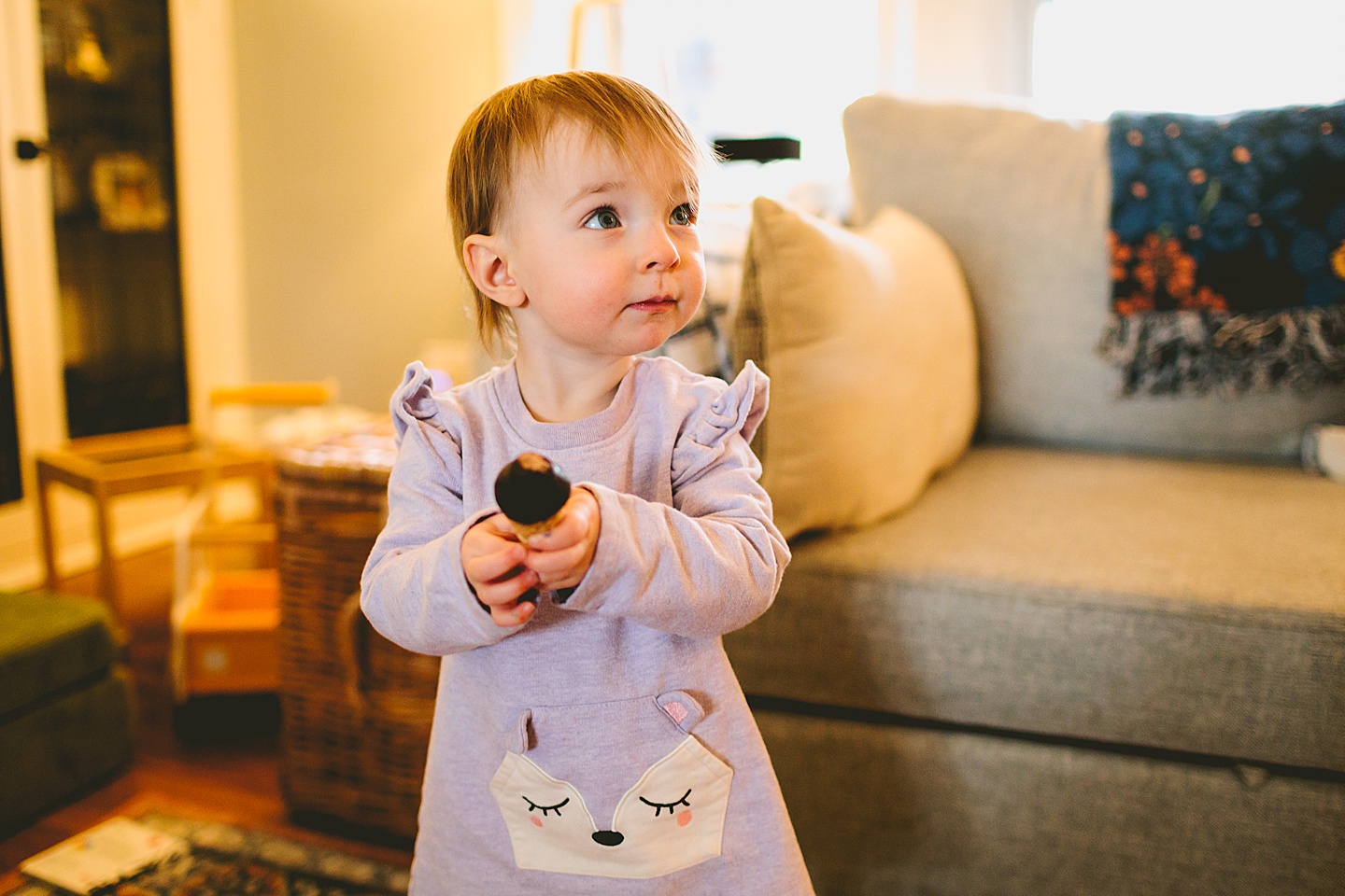 girl holding ice cream cone