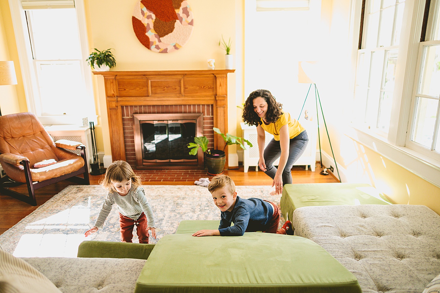 Kids having dance party in the living room during family pictures