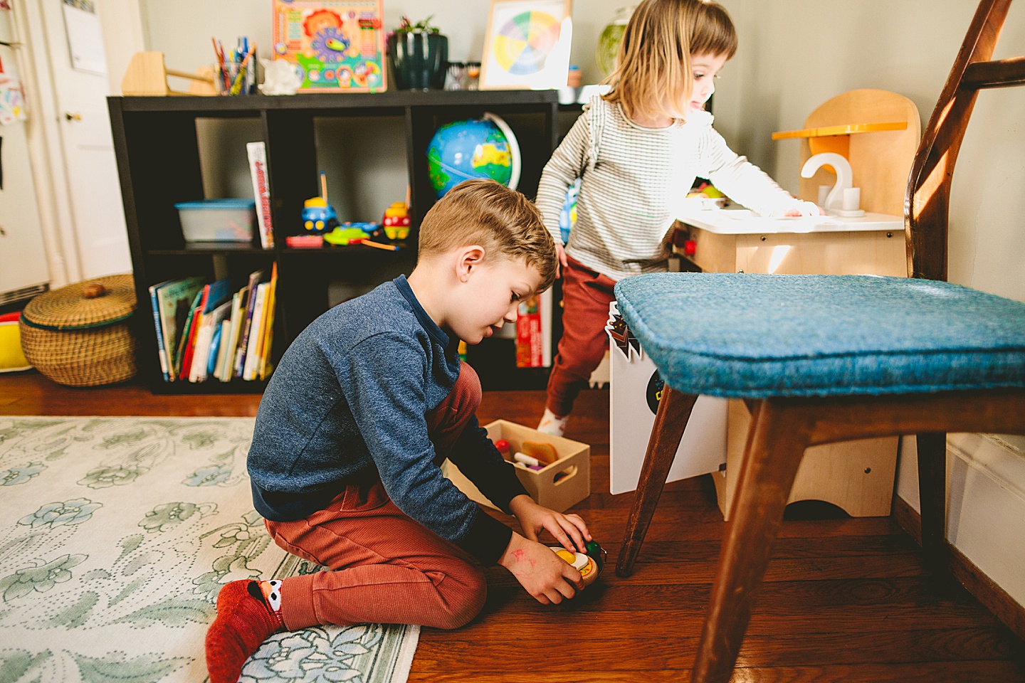 Kids making food in pretend play kitchen