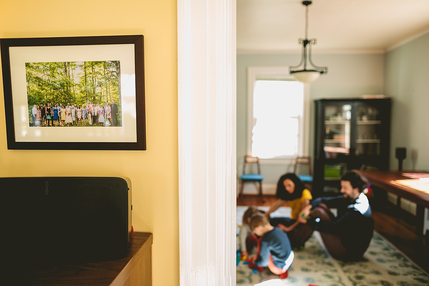 Wedding portrait hangs on the wall of the family home