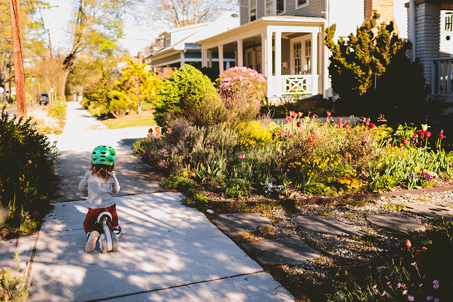 Girl riding bike in neighborhood