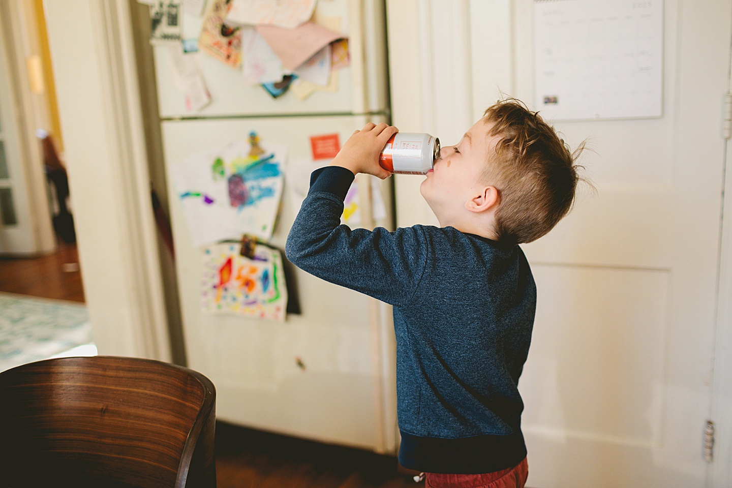 Kid drinking a carbonated water