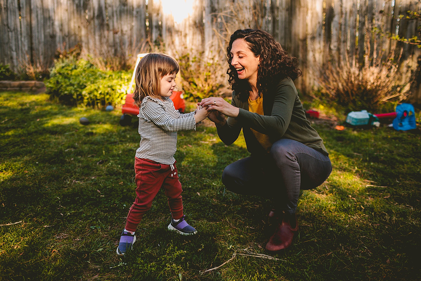 Daughter handing mom a seashell