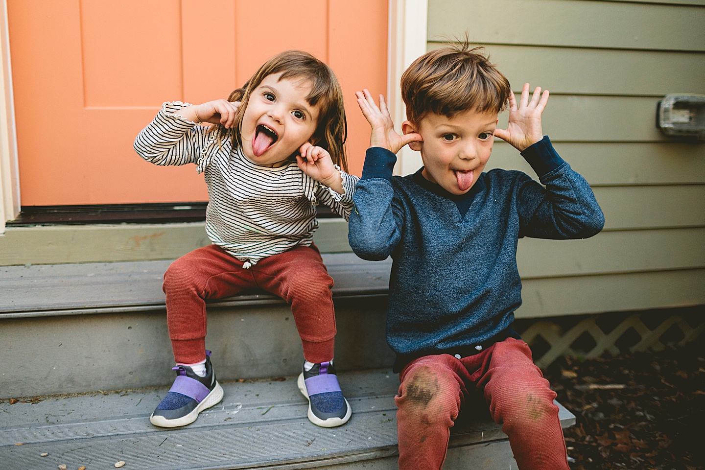 Brother and sister portraits with silly faces