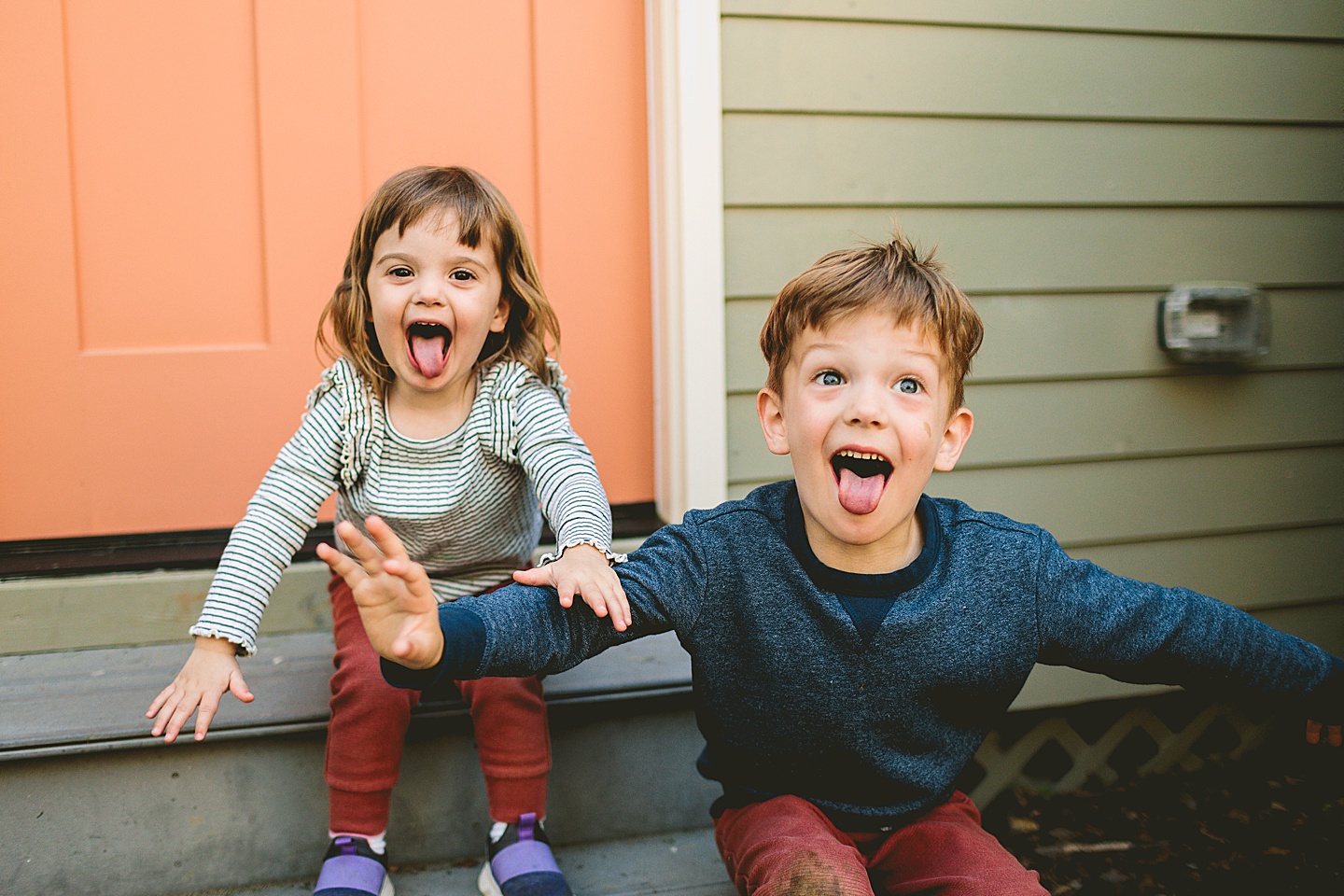 Brother and sister portraits with silly faces