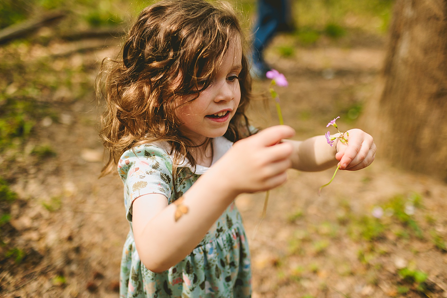 Girl picking wildflowers