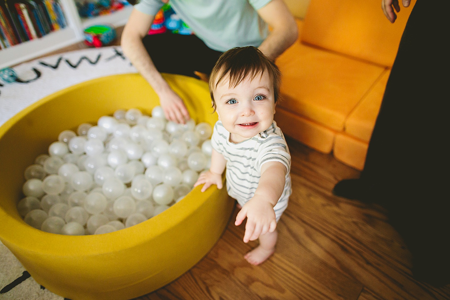 Baby playing in ball pit