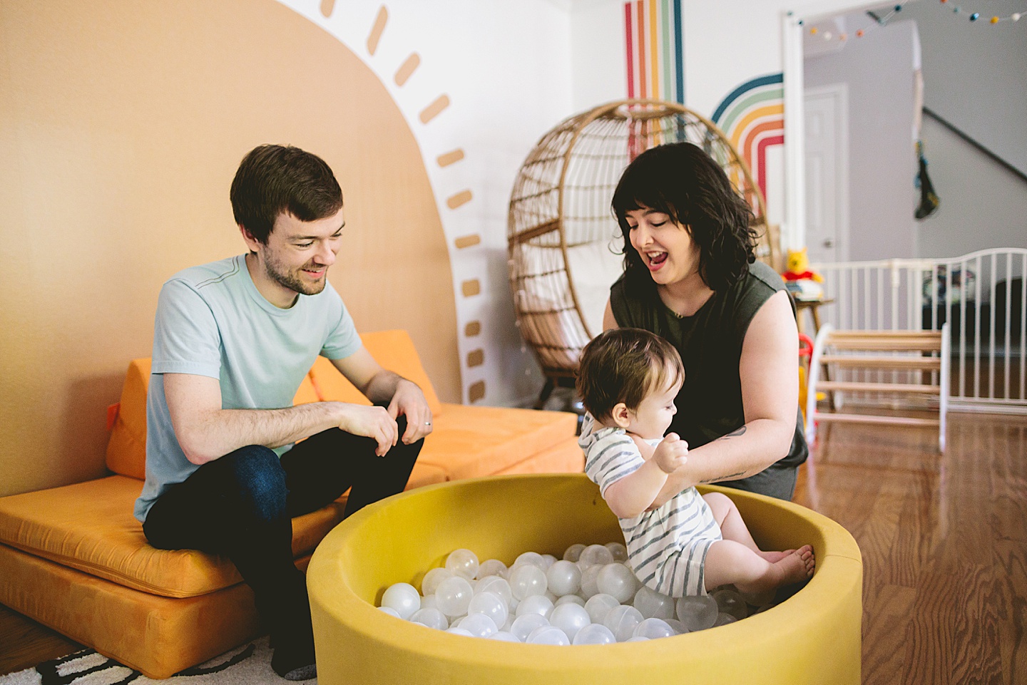 Baby playing in ball pit