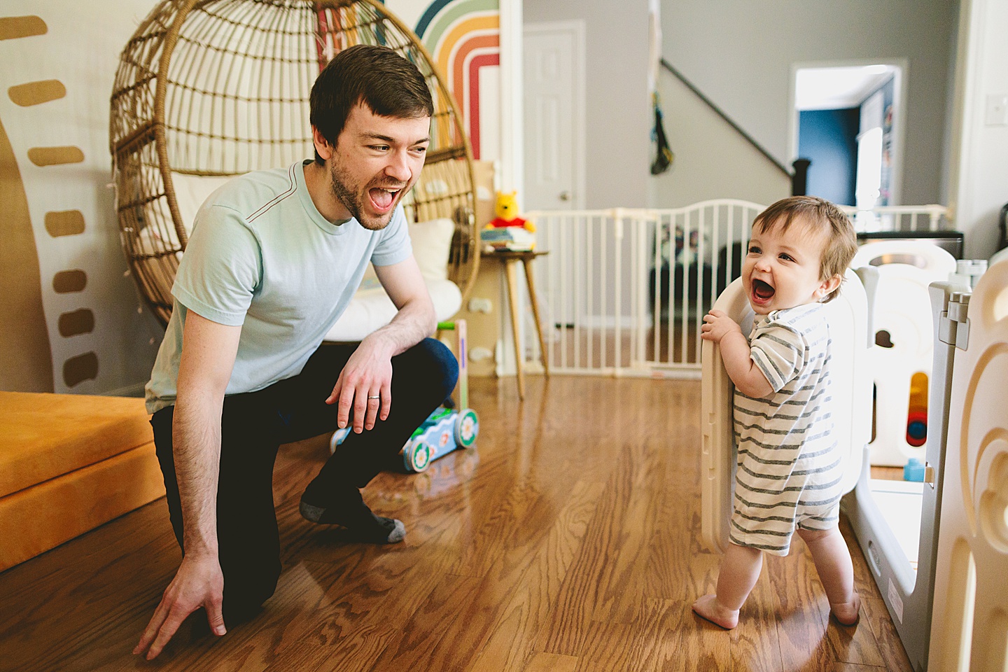 Dad and baby laughing