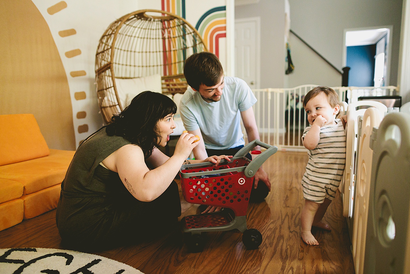 Parents entertaining baby