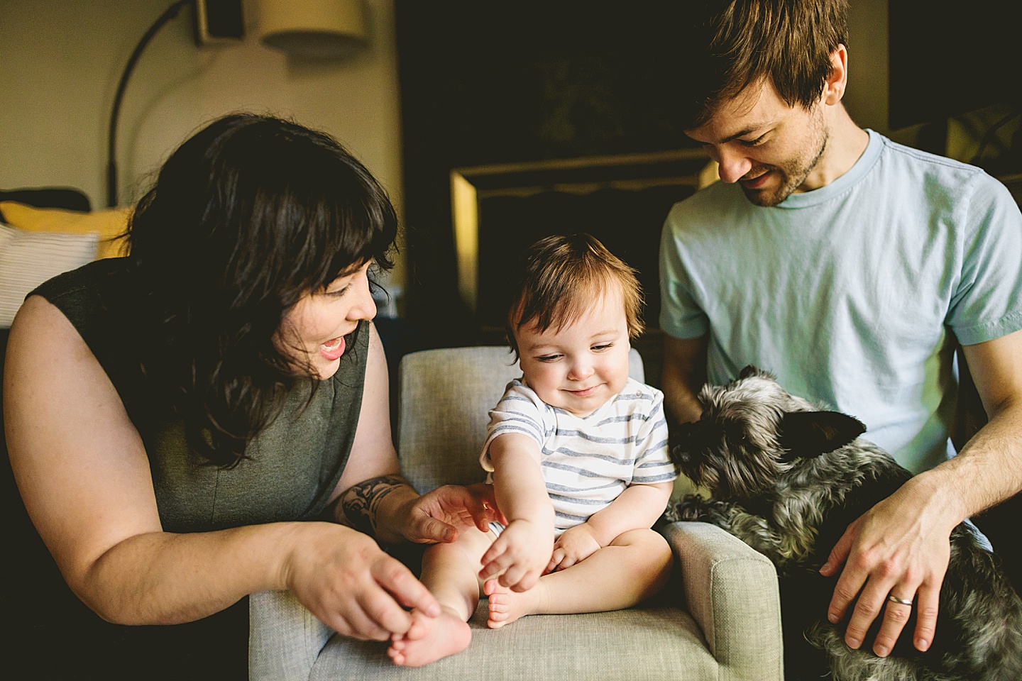 Laughing baby with dogs