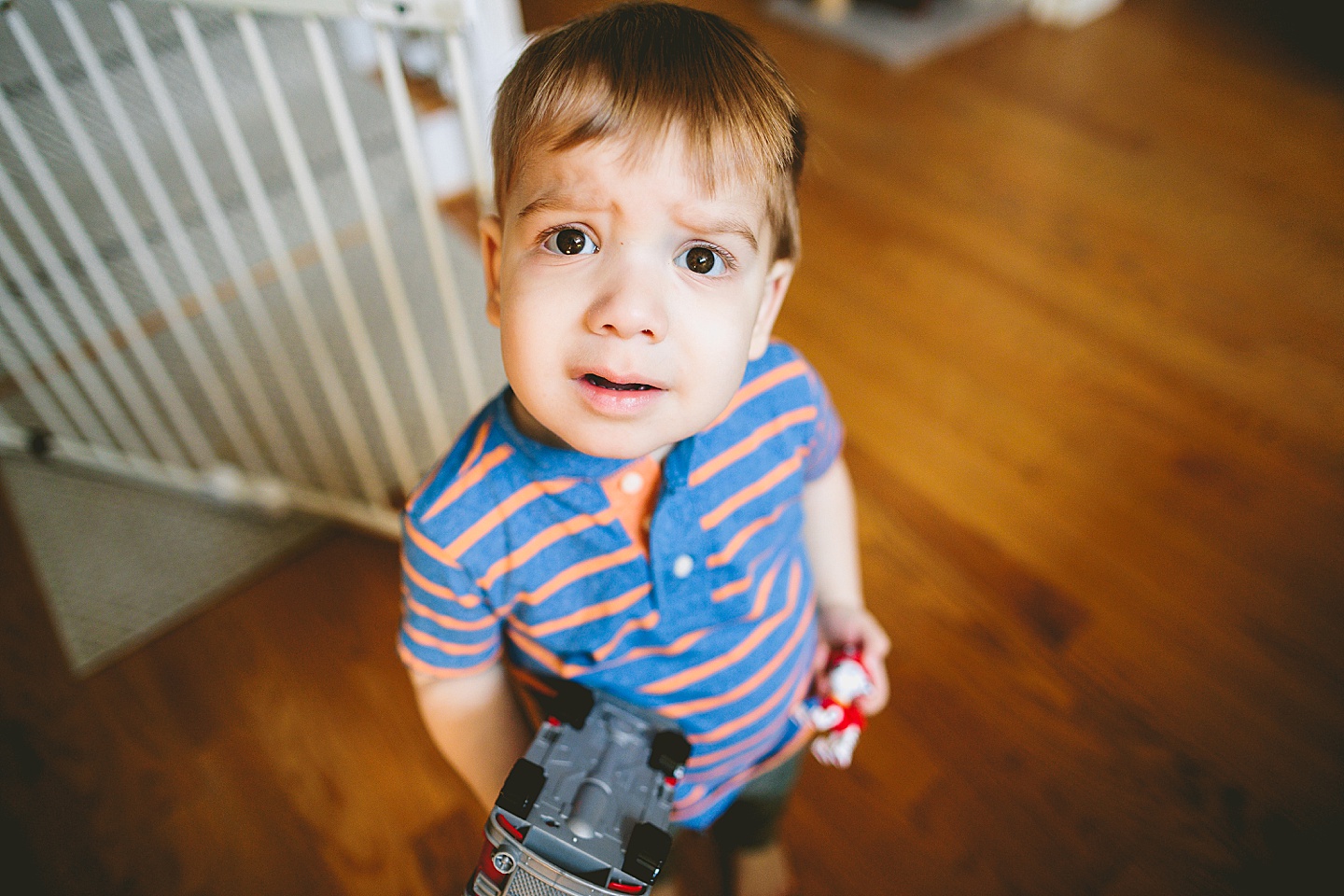 Worried toddler looks at camera