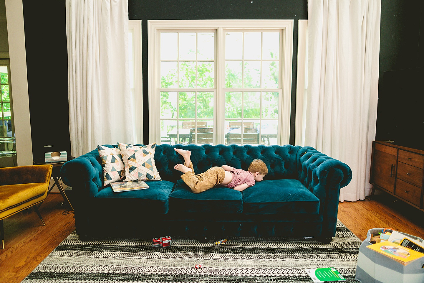 Kid jumping on the couch