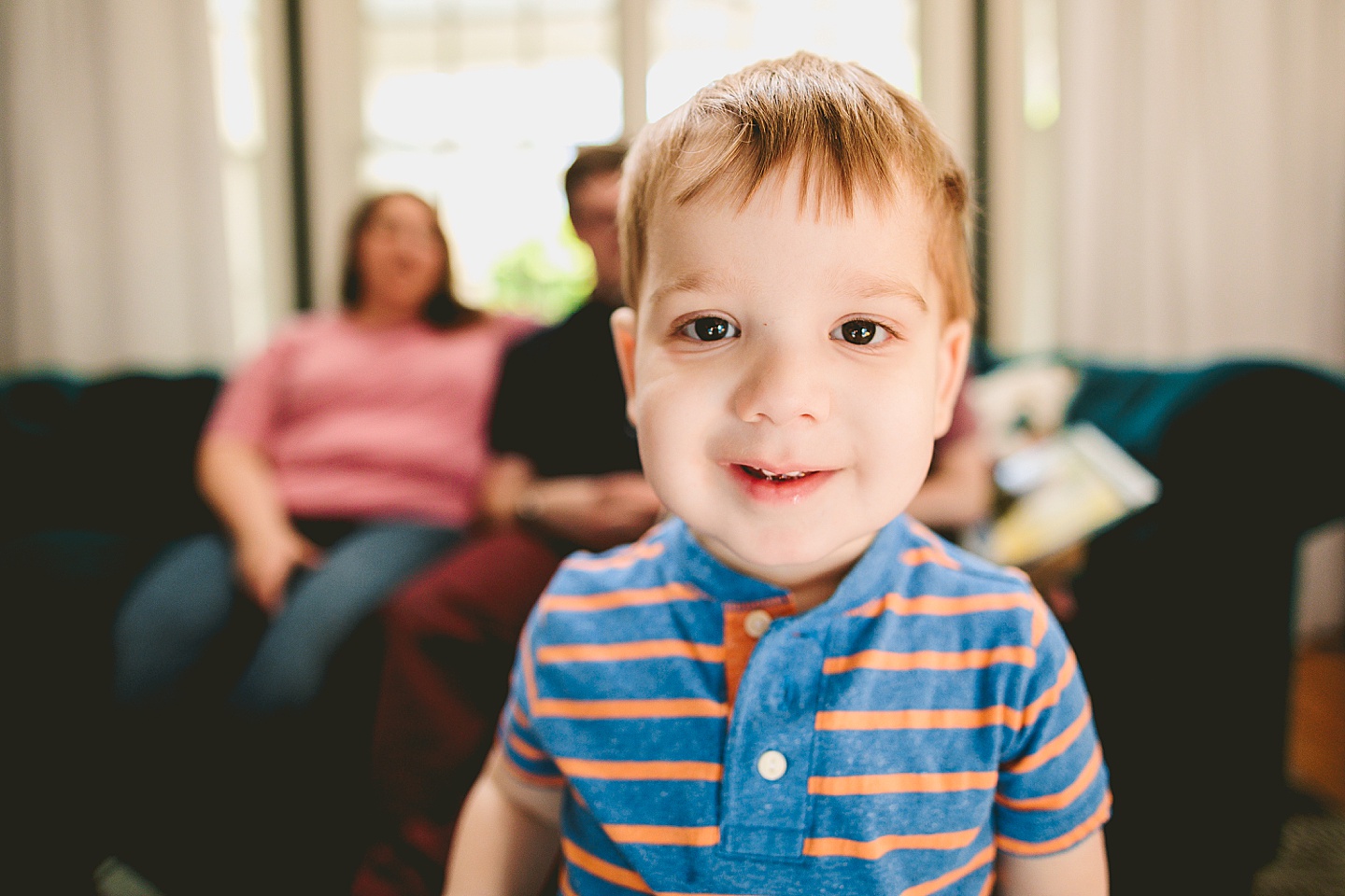 Toddler smiling at the camera