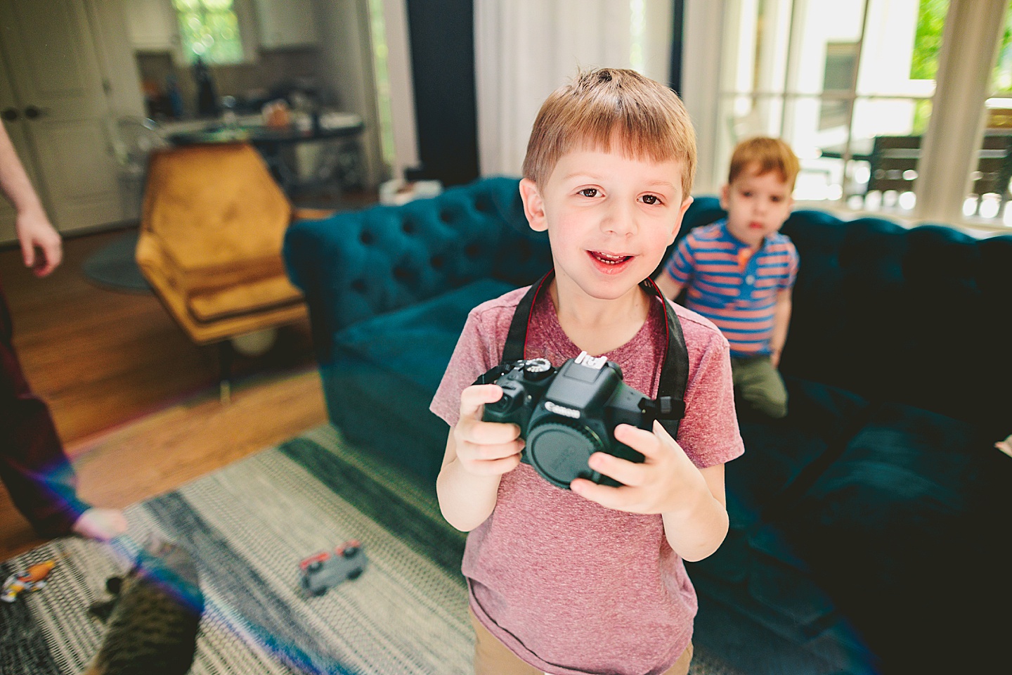 Boy holding a camera