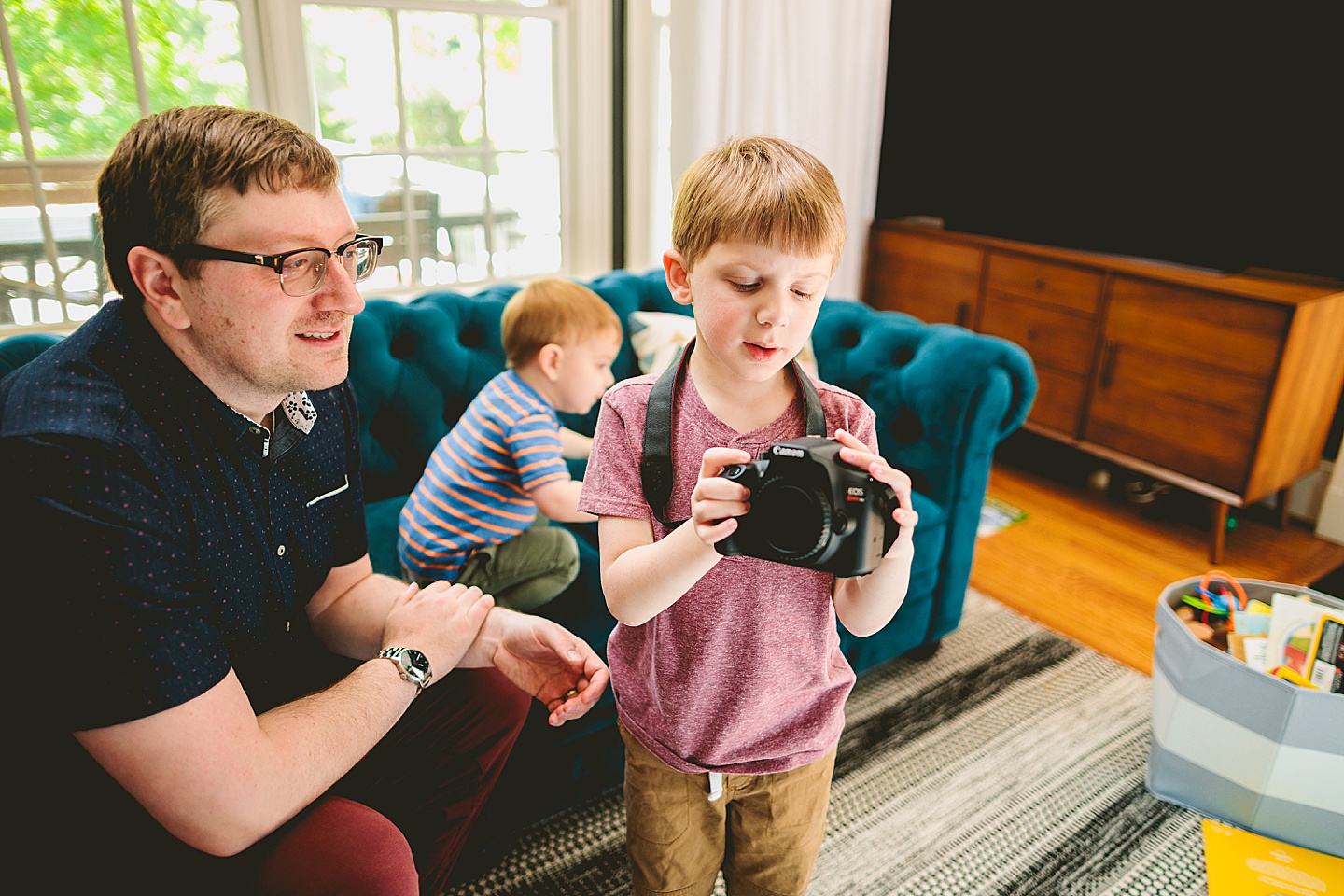 Kid looking at a camera