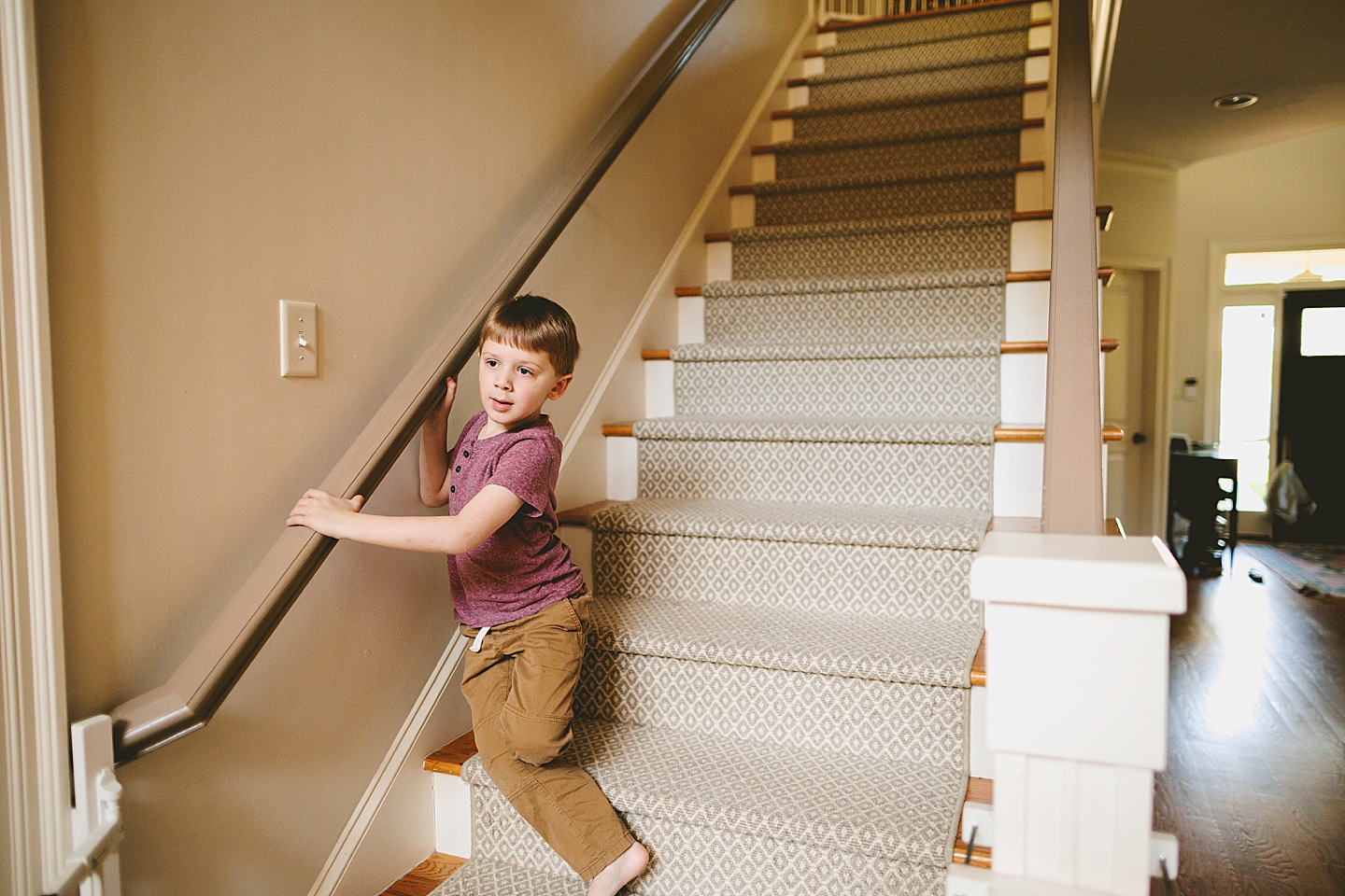 Kid running up the steps