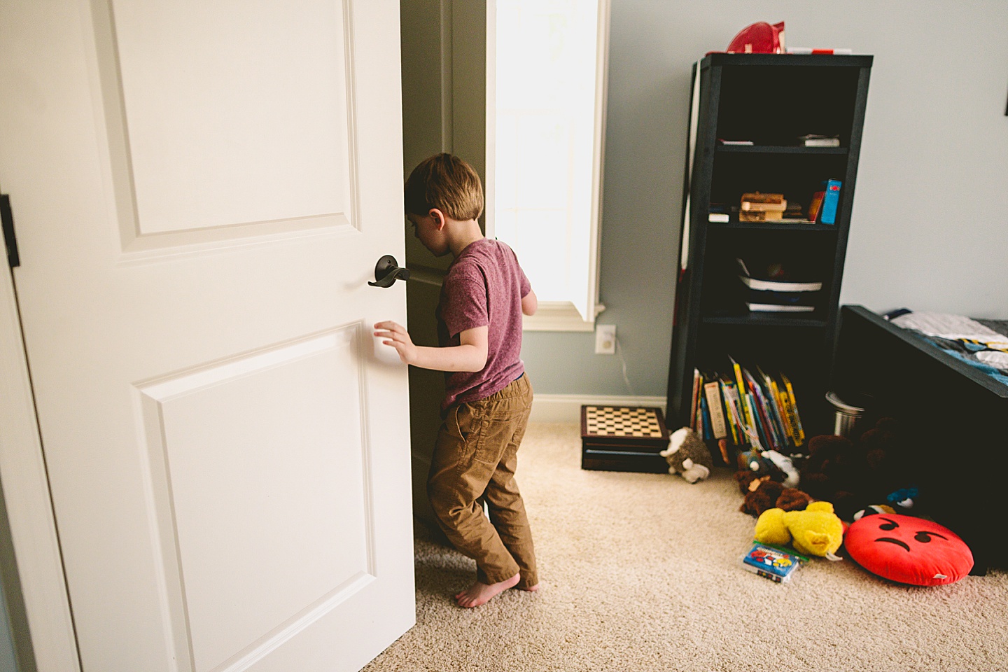 Kid opening his closet door