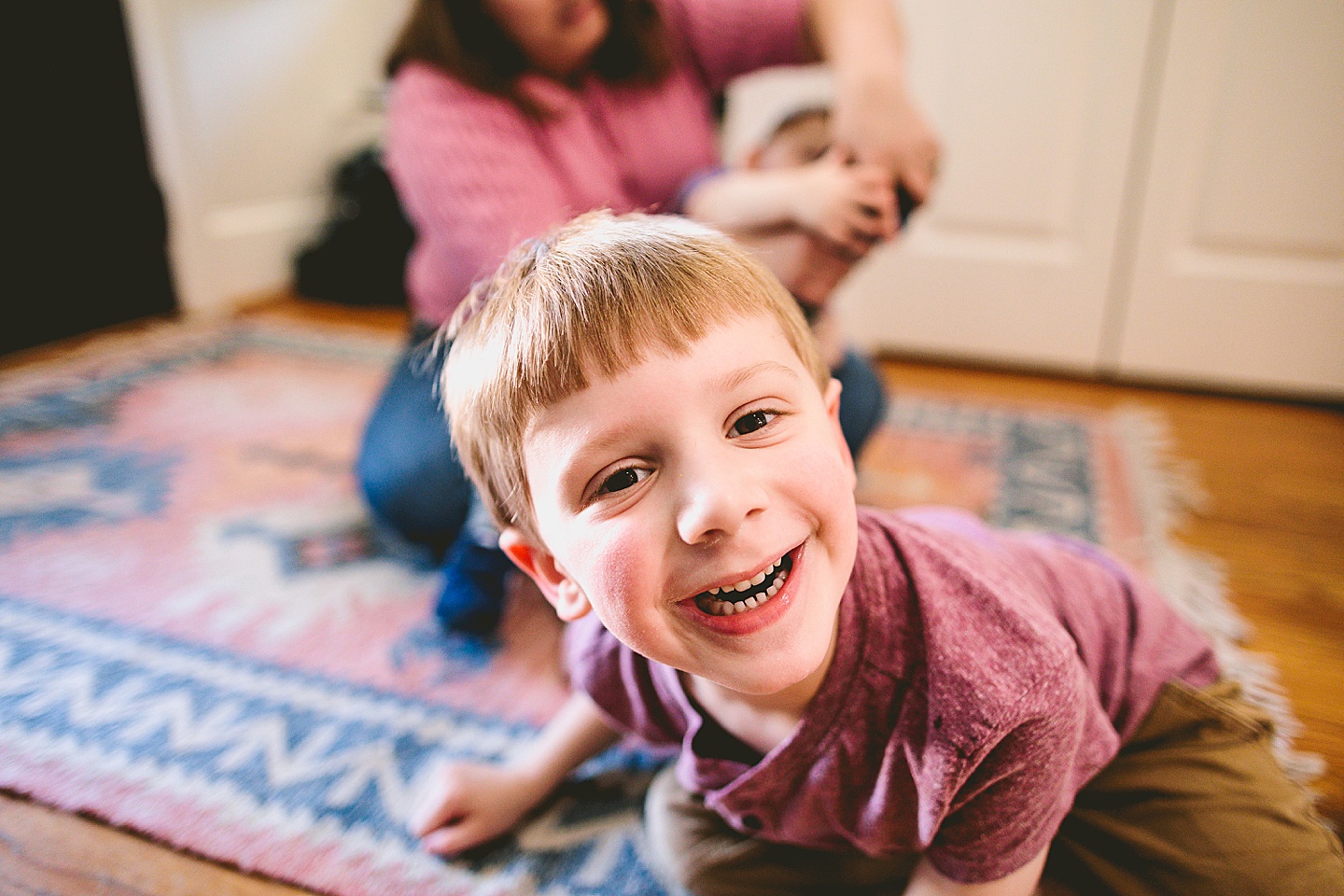 Kid smiling into the camera