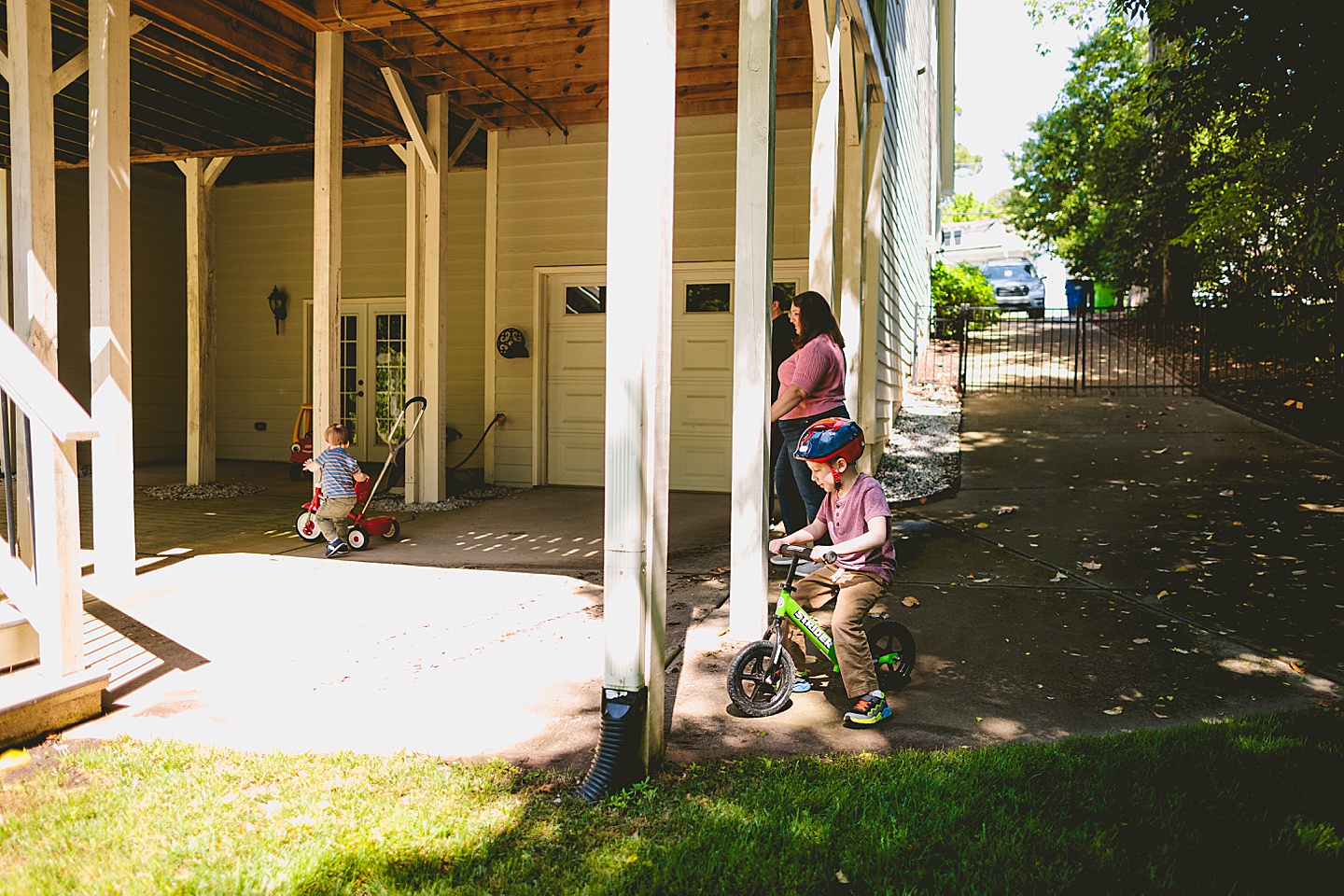 Kids riding bikes around the yard