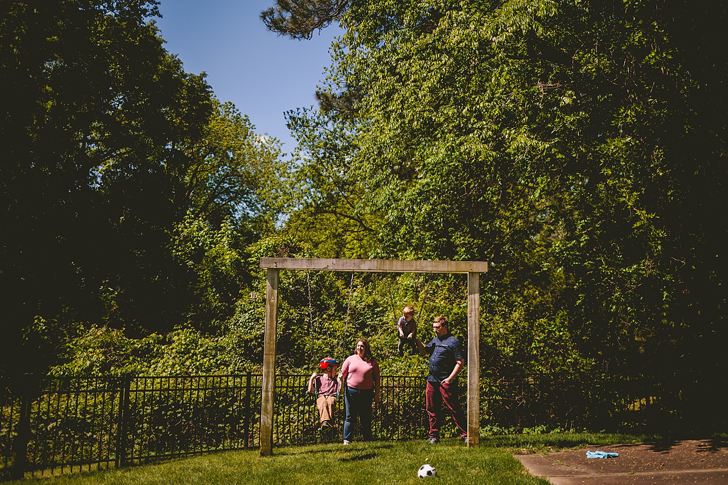 Kids using backyard swingset