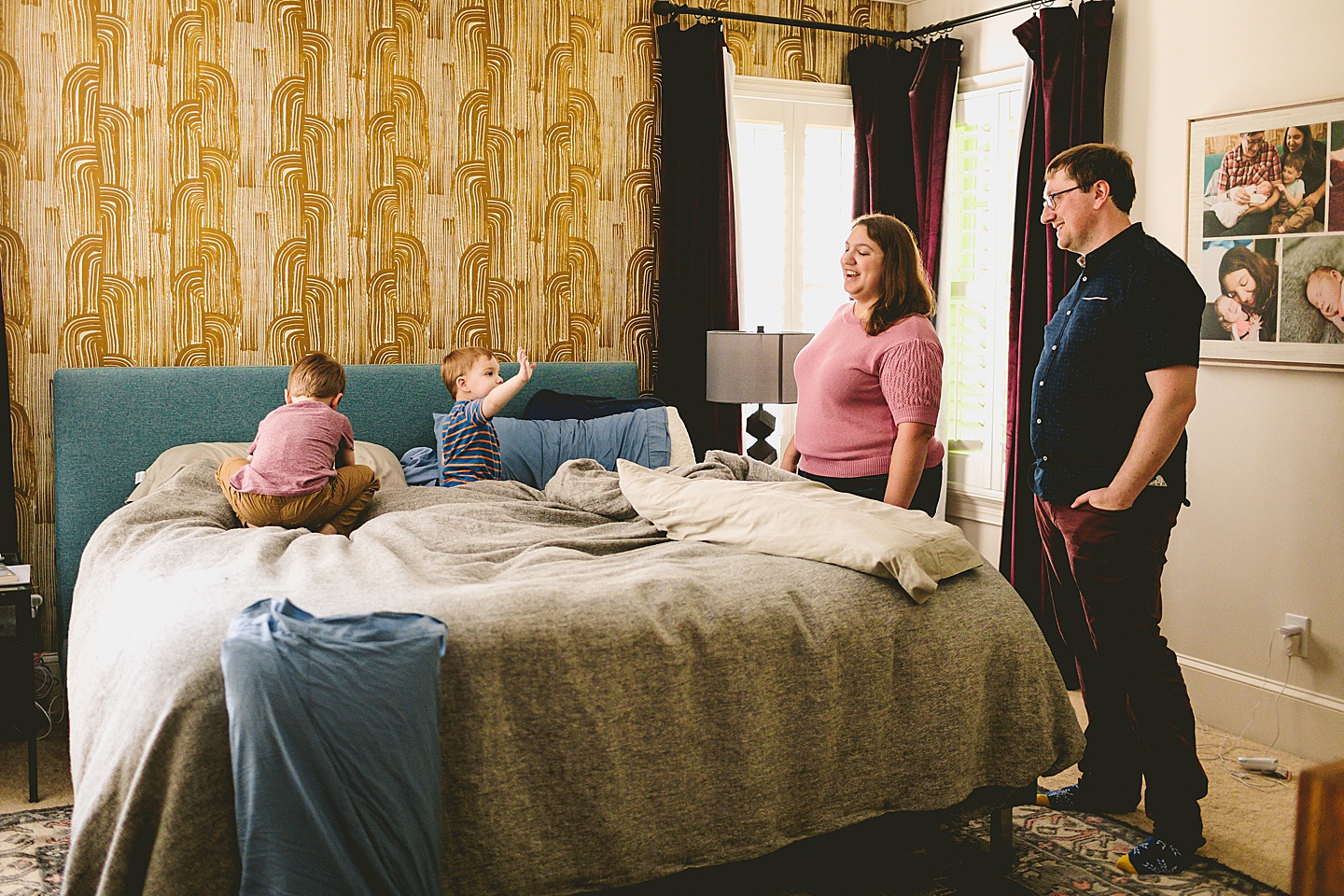 Kids playing on parents' bed