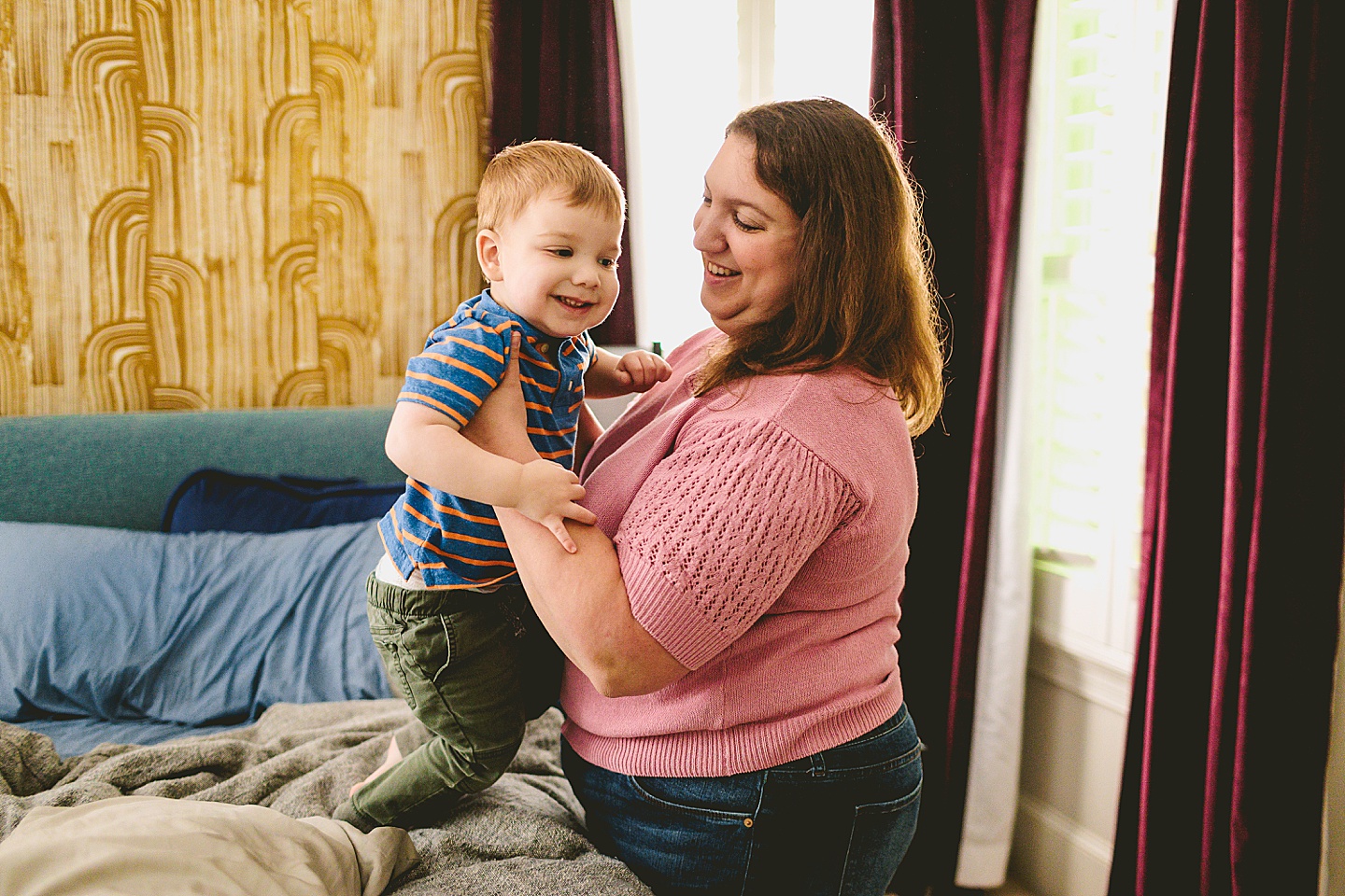 Mom holding son